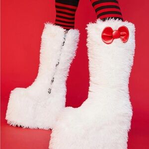 Dolls Kill White Fuzzy Knee-High Boots with Red Bow Accent